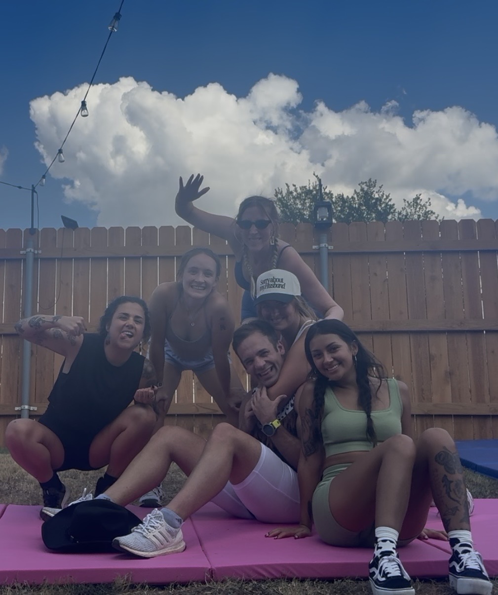 Women smiling together after a Kick His Dick class