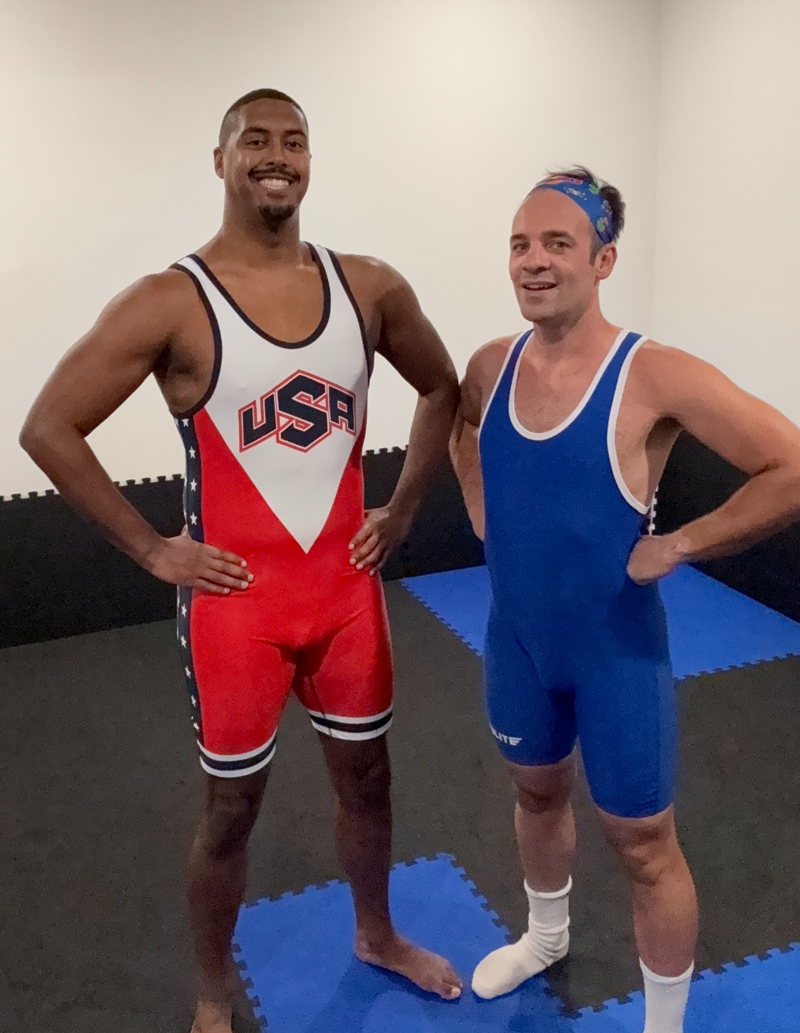 Jesse and Michael standing together before their wrestling match
